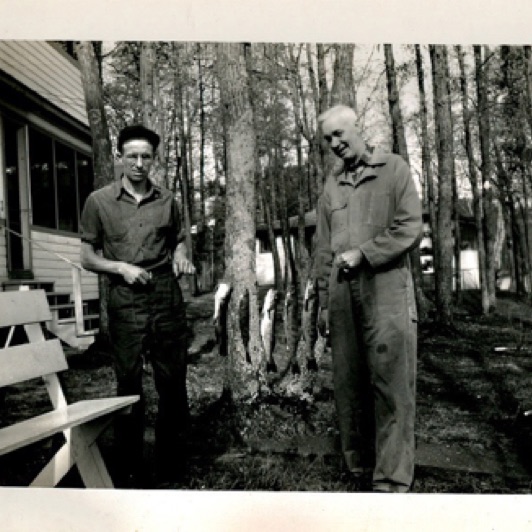 Here's a couple guys with a stringer of Walleye. They had to stock them back then too.