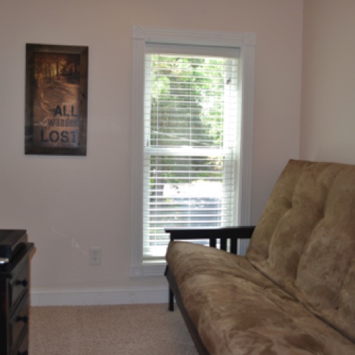 This bedroom is also on the second level and has a futon and small TV. Good for a little daytime getaway!